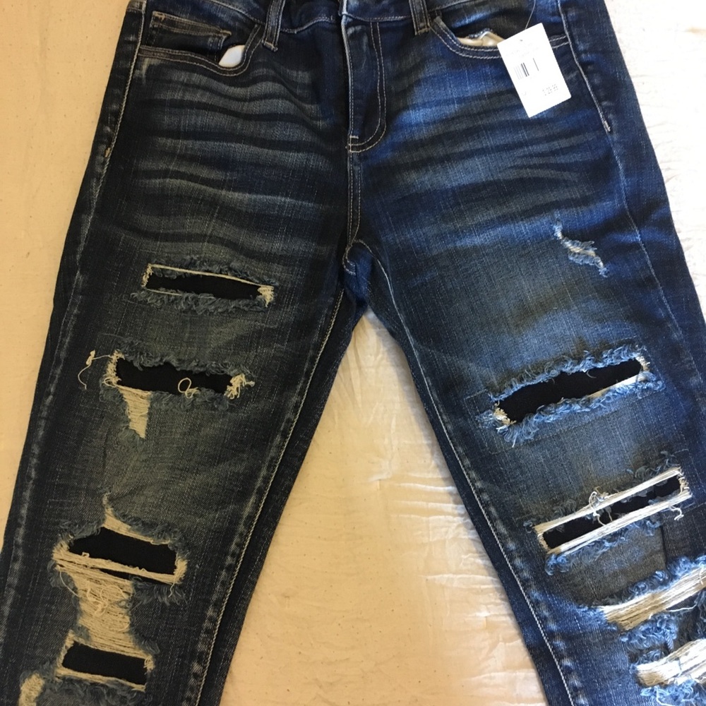 Ripped Wax jeans brand new